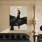 Woman in Straw Hat Riding a Black Horse