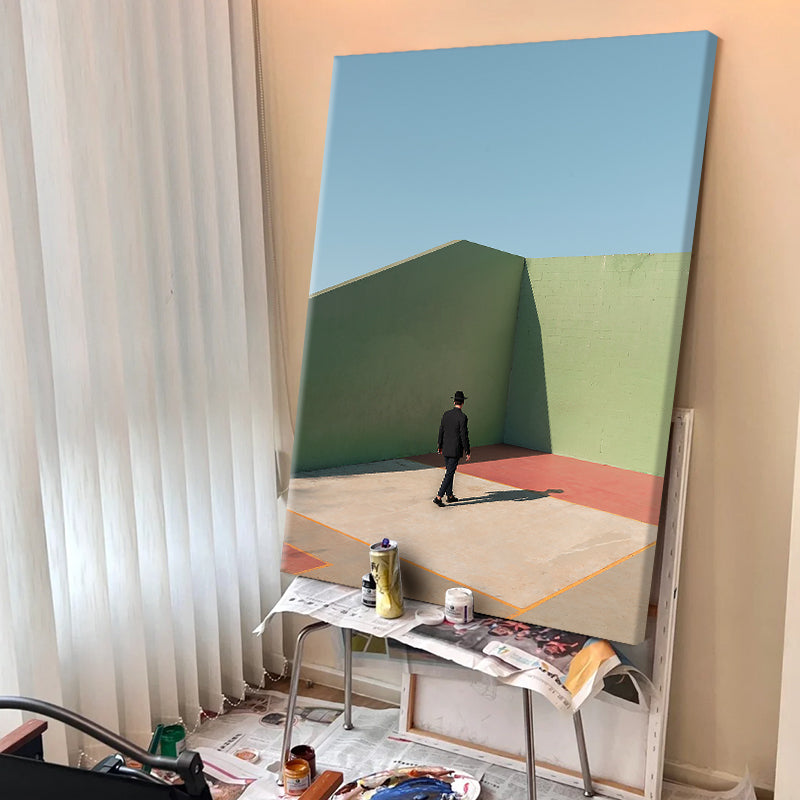 Man in Hat on Green Wall